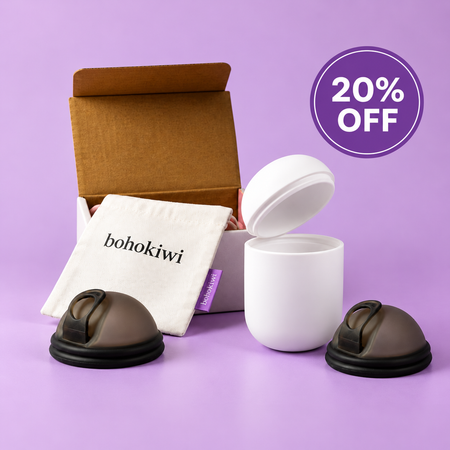 bohokiwi black menstrual disc with white  pod and box and storage bag