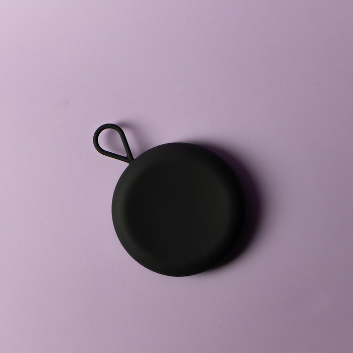 Bohokiwi Black round menstrual disc carrier case with hanging loop