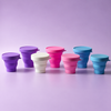Bohokiwi collapsible menstrual cup and disc sterilisers displayed in multiple colours