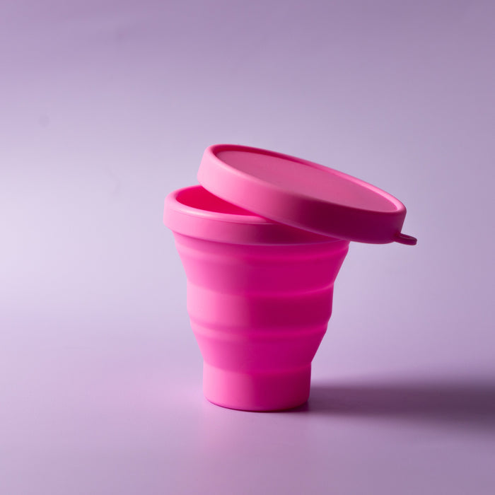 Bohokiwi Hot Pink collapsible menstrual cup and disc steriliser fully expanded