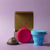 Bohokiwi Midnight Black menstrual disc with Pink round carrier case and Sky Blue collapsible steriliser