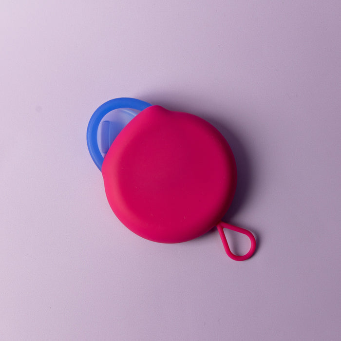 Bohokiwi Neon Pink and Ocean Blue reusable menstrual discs overlapping