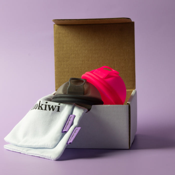     Bohokiwi pink and black menstrual discs with cotton storage bags and box