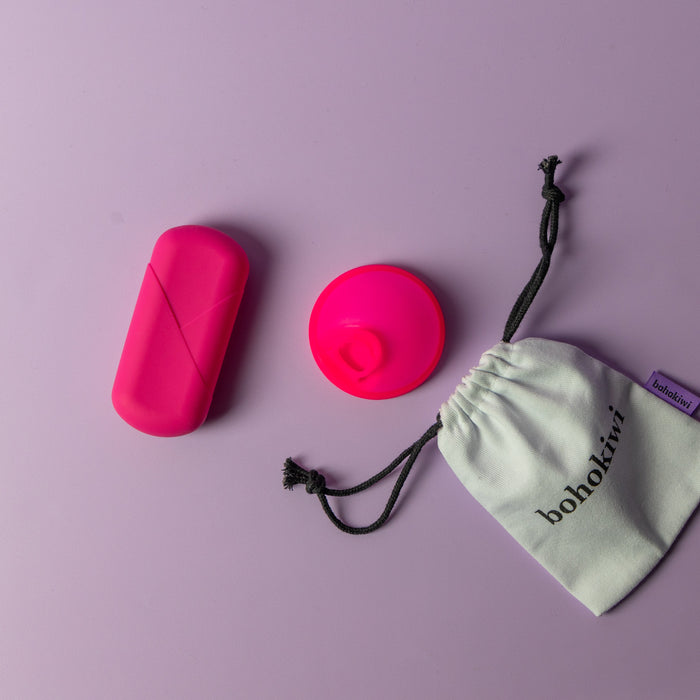 Bohokiwi Pink capsule style menstrual disc carrier case with menstrual disc and cotton storage bag