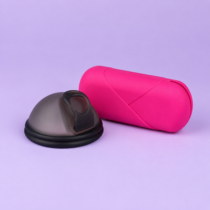  Bohokiwi Pink capsule carrier case beside a Midnight Black menstrual disc
