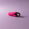 Bohokiwi Pink capsule carrier case with Midnight Black menstrual disc partially inside