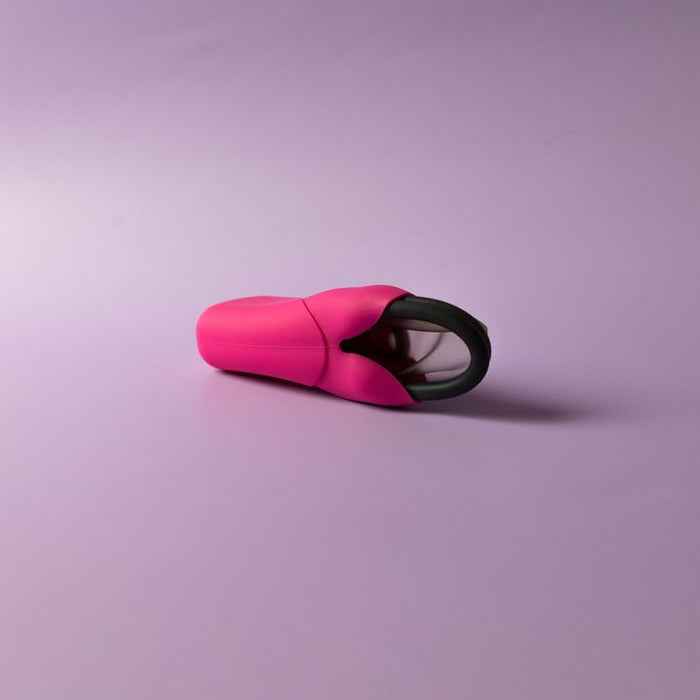 Bohokiwi Pink capsule carrier case with Midnight Black menstrual disc partially inside