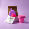 Bohokiwi Neon Pink menstrual disc with Purple round carrier case, Hot Pink collapsible steriliser and cotton storage bag