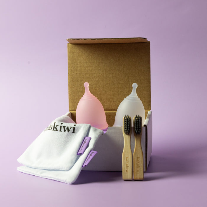 Bohokiwi Rose and Opaque menstrual cup twin pack with cotton storage bags and bamboo cleaning brushes