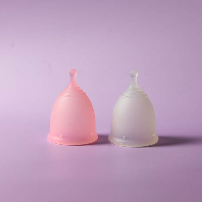 Bohokiwi Rose and Opaque reusable menstrual cups side by side