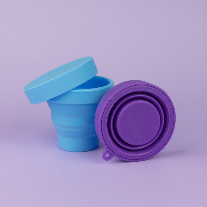 Bohokiwi Sky Blue and Purple collapsible sterilisers shown collapsed for compact storage