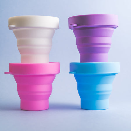     Bohokiwi collapsible menstrual cup sterilisers in white, purple, pink and blue