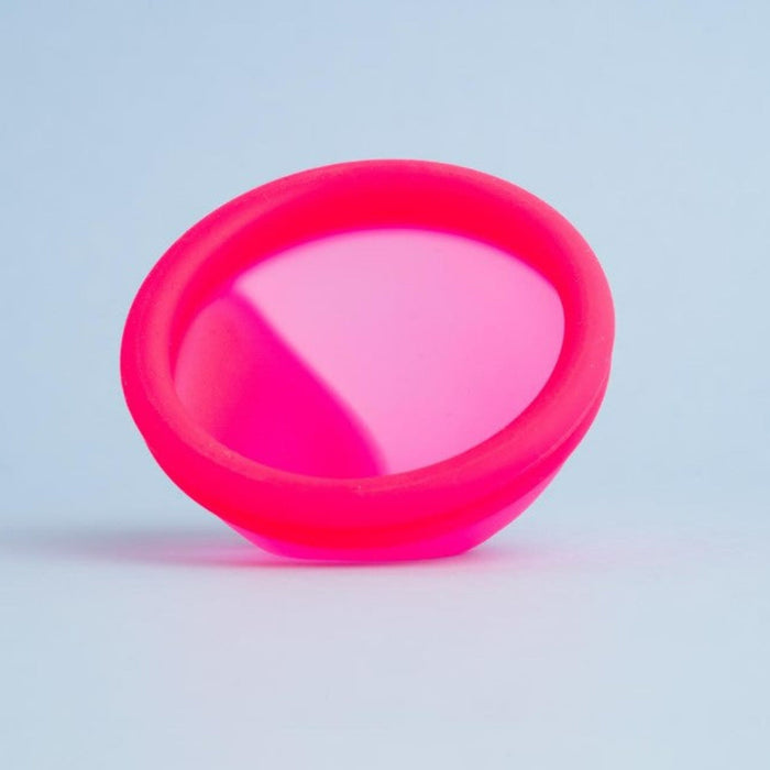     Bohokiwi pink menstrual disc showing the flexible rim